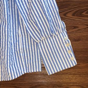 Blue and white top with vertical stripes